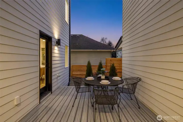 Just outside, a cozy patio. Perfect for enjoying the morning breeze with your coffee