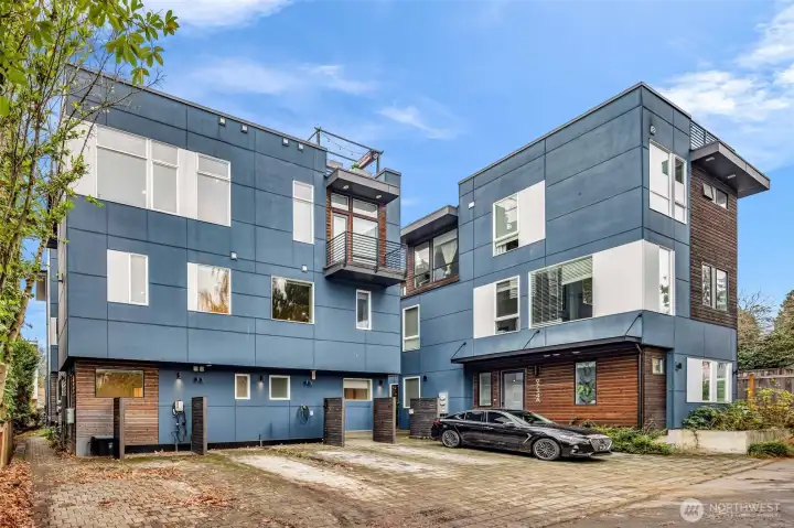 Far Left Corner (split that building into two units 9732-A is the full Southern half) deeded parking is in the middle, with EV.