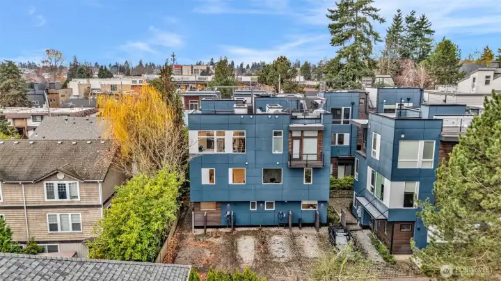 Far Left Corner (split that building into two units 9732-A is the full Southern half) deeded parking is in the middle, with EV.