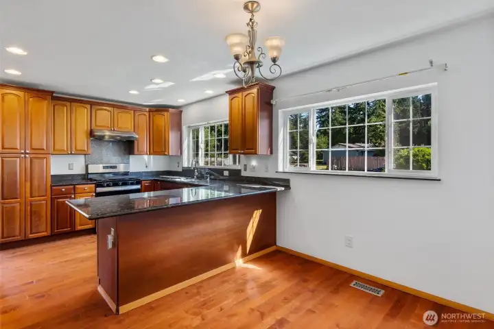 Granite counters and tons of cabinets