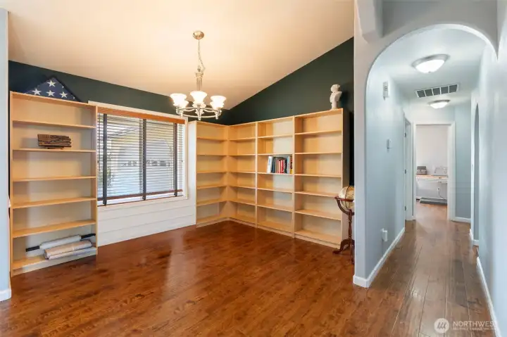Entrance, bedrooms, laundry room, garage down the hallway.