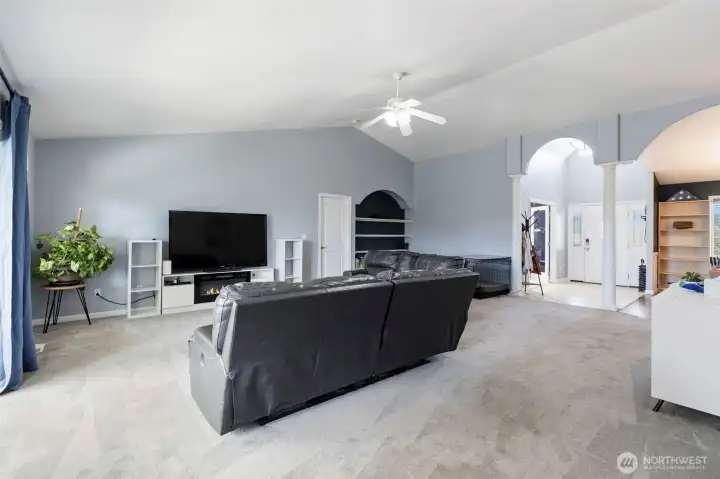 Tiled entrance to the right. Vaulted ceilings and lots of windows to let in lots of light.