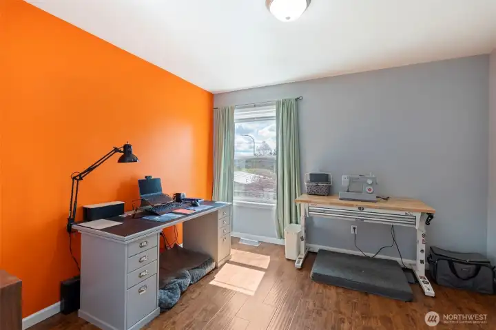 Second bedroom with bright light from bug window.