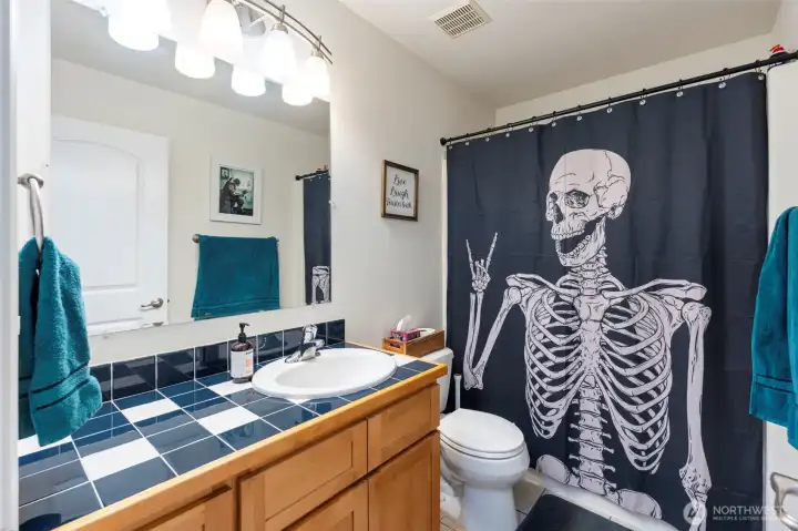 Full second bath for other end of the house and 2 other bedroooms.