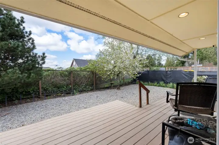 Nice covered back deck for sitting and enjoying the beauty around.