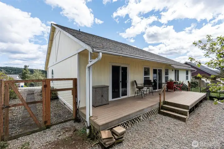Low maintenance yard with beautiful cherry tree.