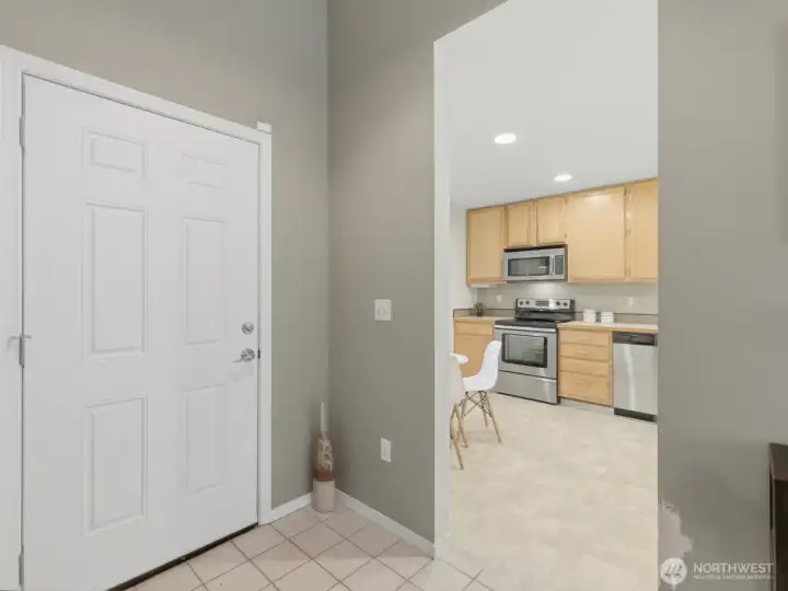 front door and kitchen