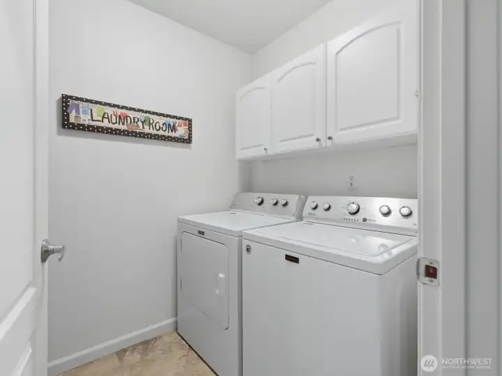 washer dryer room beside 2nd bedroom