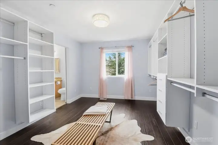 Don't miss the incredible walk-in closet featuring a California Closet system!