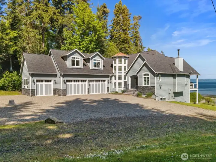 Plenty of parking for RVs, boats and all of your toys with this generous 3 car garage and expansive driveway.
