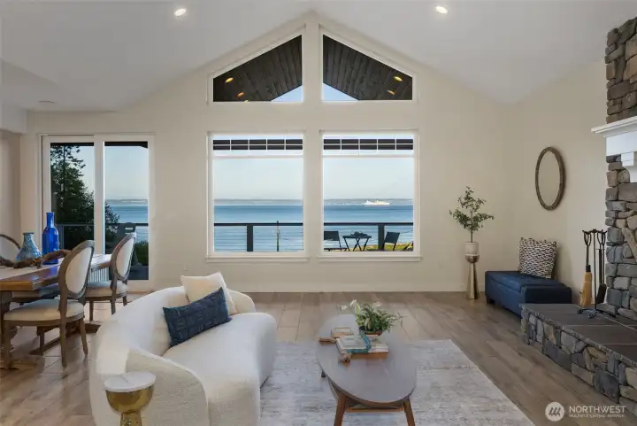 Vaulted ceilings, stone fireplace, in floor radiant heat tile floors and endless views!
