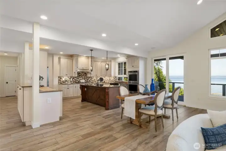 Open concept, sliding door to covered deck, in floor radiant heated tile flooring, chefs kitchen...VIEWS!