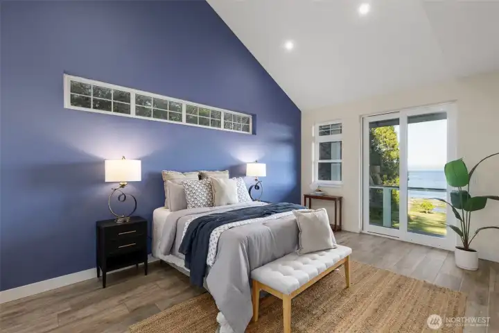 Main floor primary suite with 2 closets AND access to deck to soak up those views!