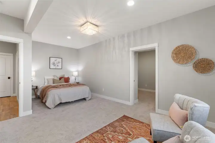 Lower level bedroom with ensuite AND water views...through the doorway on the right, a room sized closet!