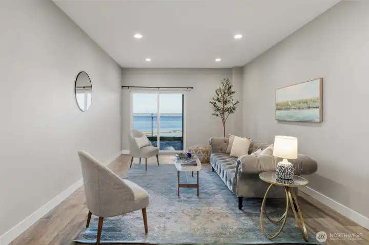 Lower level living space, rec room...how would you use it? Slider to water view covered patio!