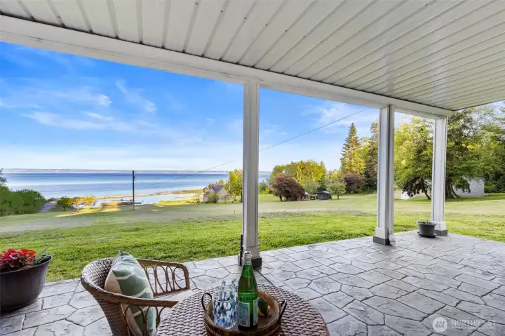 Lower level covered patio off living space/rec room. Enjoy this space rain or shine!