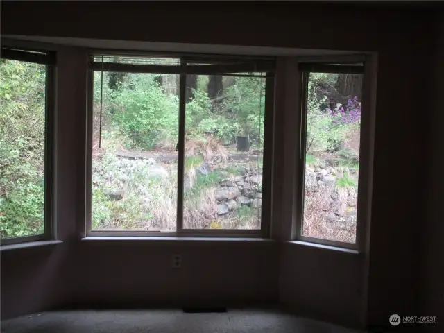 Master bedroom looks out to back yard.