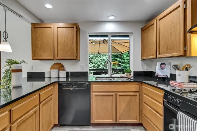 Kitchen cabinets include sturdy pullouts to maximize space and convenience
