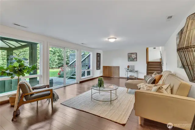 Expansive wall of windows overlooking the backyard