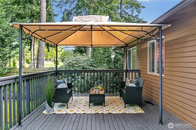 Deck off the kitchen with a covered gazebo for shade