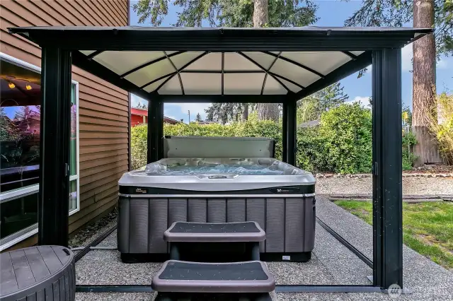 Salt water hot tub with covered gazebo for privacy