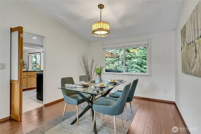 Dining room with kitchen to the left