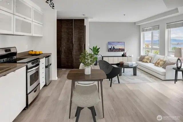 Wake up to stunning sound views in this charming studio condo, where large windows invite in natural light and serene waterfront scenery.