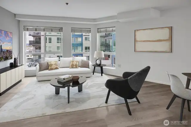 Inside, the open-concept layout offers modern finishes and efficient living, all just steps from vibrant local shops, dining, and the waterfront.