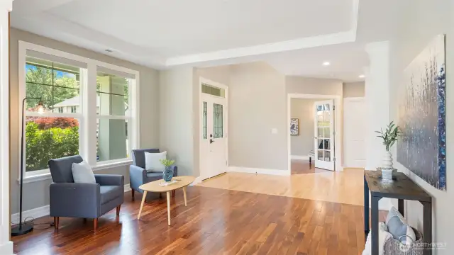 Just to the left of the front door (as you walk in), you’ll find a main floor office framed by classic French doors - an ideal space that adapts to your needs. Whether you're running the show from your home office, hosting overnight guests, or creating a cozy reading nook, this versatile room adds both function and charm right where you want it.