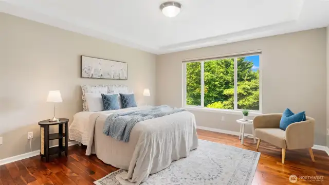 The primary suite offers the kind of space you rarely find - roomy, restful, and perfectly positioned at the back of the home for added privacy. Wake up to views of the lush backyard, enjoy the soft morning light, and wind down each day in your own private haven. There’s space here for a full bedroom set, a cozy reading chair, or even a small workspace - so much flexibility, all in one serene space.