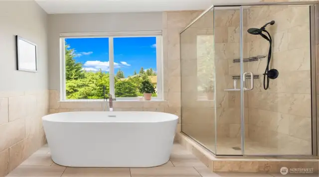 This recently-added freestanding tub adds all the wow! Made for long, relaxing soaks, feel your cares unwind.  Clean, calming, and designed for real-life luxury, this space is the perfect way to begin and end your day.