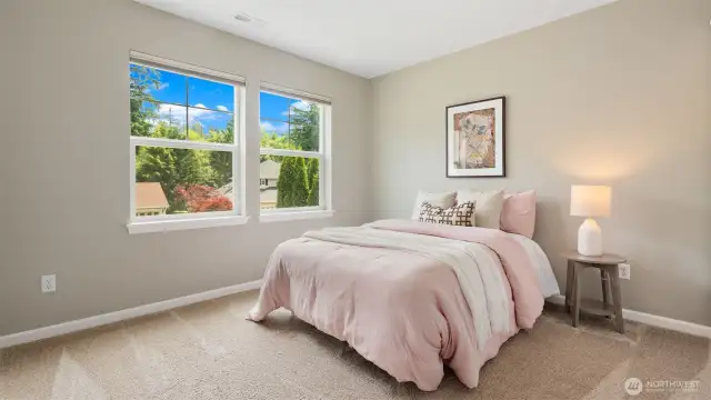 Bedroom 2 is bright and inviting, with a generous layout that offers space to rest, work, or play. Whether you need a guest room, hobby space, or a comfy retreat, this room is ready to flex with your needs.