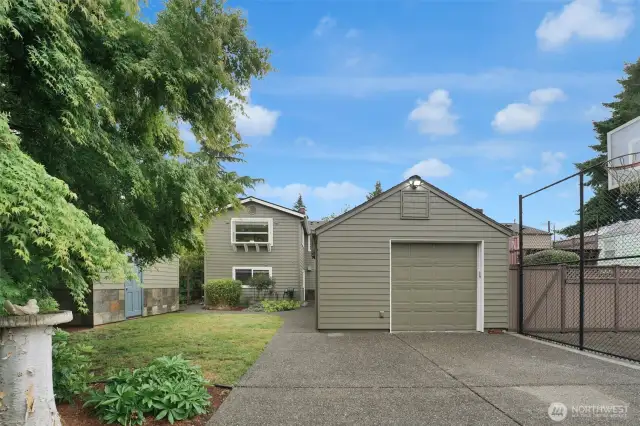 Paved alley access to 2 parking spaces and garage