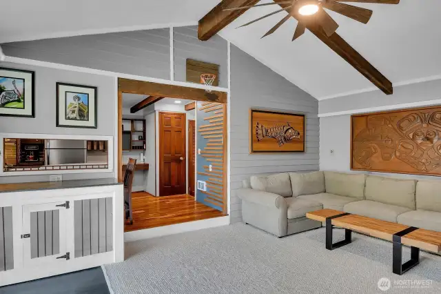 Bright and spacious family room with vaulted ceiling.