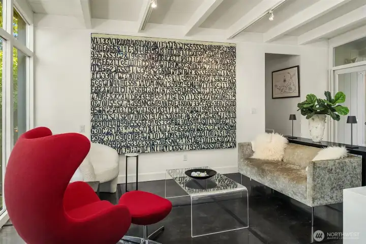 Spacious sunroom with polished concrete floors