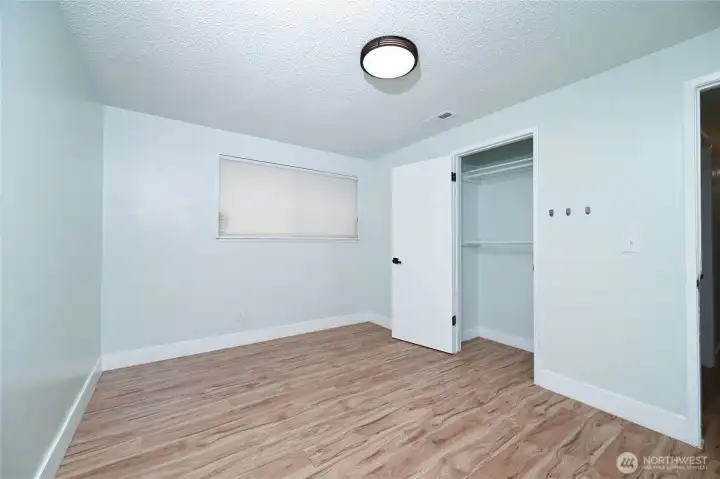 View of large bedroom #3 ready for all your furnishings and walk in closet