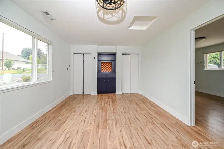 Here is another view of bonus room and 4th bedroom entry to right with views of court yard and front of home.