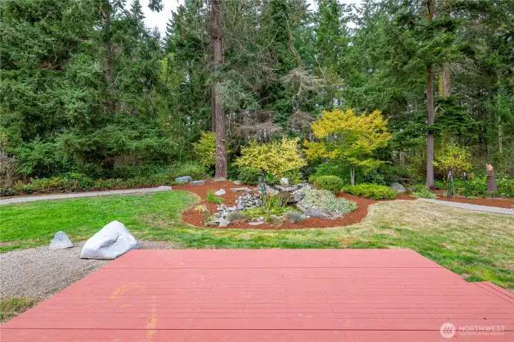 Enjoy the beautiful landscaping, including the custom water-fall feature!