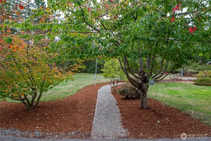 Beautifully landscaped, with fruit trees to enjoy. Plenty of room to expand on these 2.5 acres.