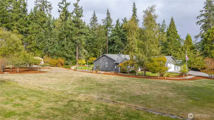 See carport where tractor is parked at the back of the property. A perfectly lovely rural setting on a private dead end street. Come and enjoy island living at it's best! Beaches and state parks are nearby and Ft. Nugent park is just down the road.