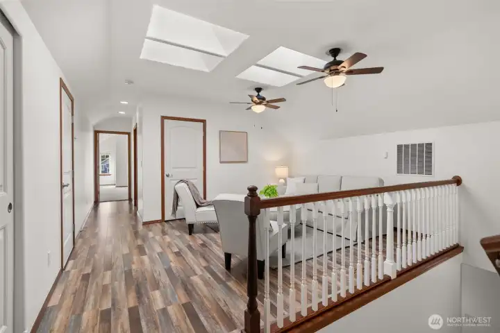 Loft area: 4 skylights, 2 fans, closet space.