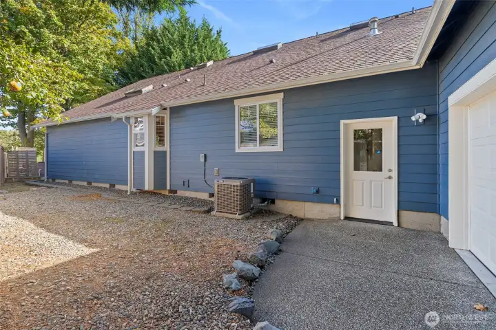 Left side of property - access from garage.
