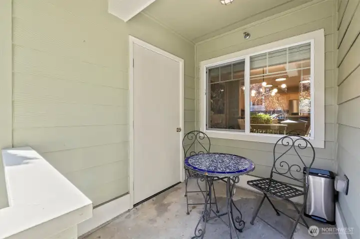 Front porch for that morning cup and a large storage unit for extra stuff.