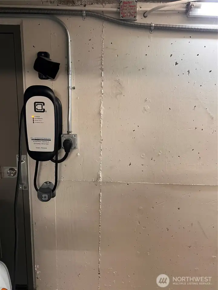 EV Charger is NOT included, but other owners have added this feature.