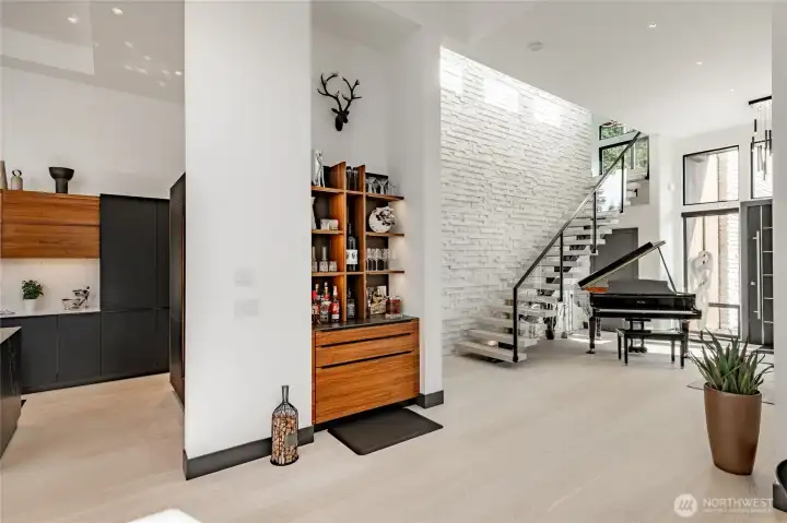 Wet bar and staircase to the upper level.