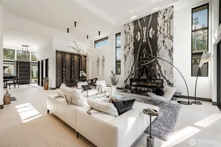 Formal living room with Booked Matched porcelain gas fireplace.