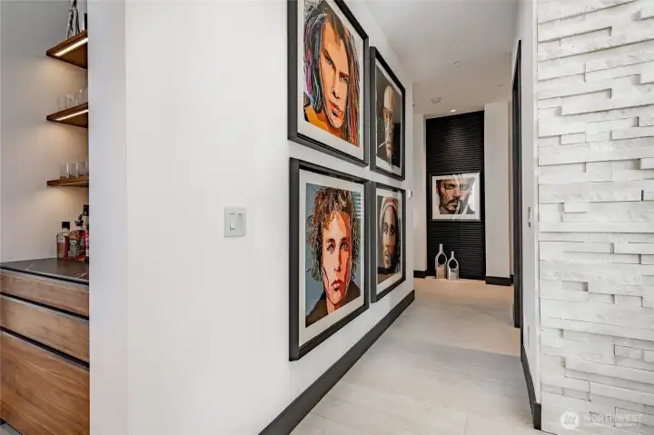 Hallway going to the primary bedroom and guest bedroom.
