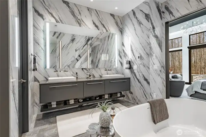 Custom mirrors and double vanity. Cabinets are from German Kitchen Design Center.