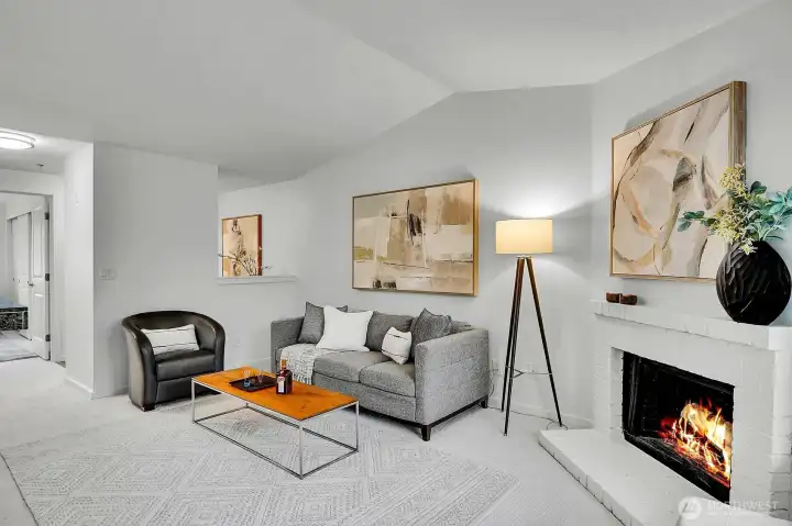 Living Room with Cathedral Ceilings & Wood Burning Fireplace