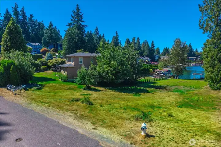 The lot has easy access from the street and is mostly cleared and ready to build on.